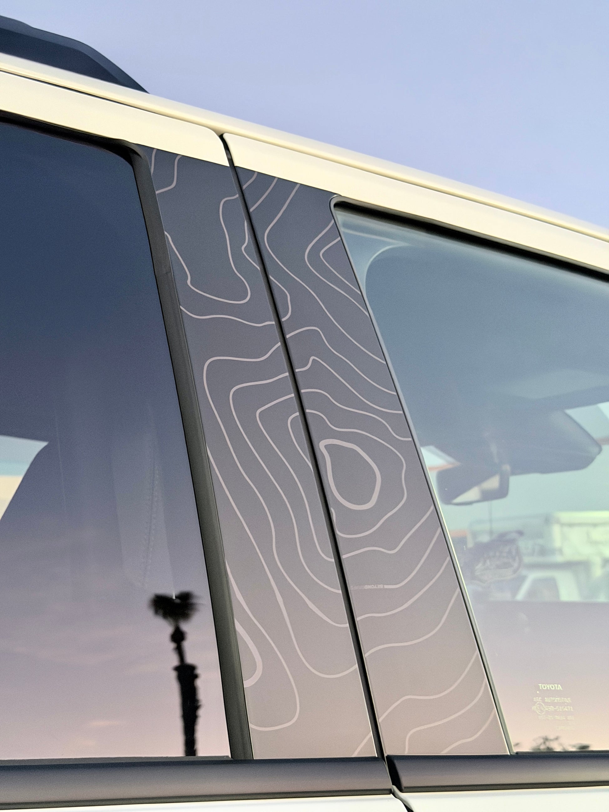 Topographic door pillar wrap installed on Toyota 4Runner showing UV protection and custom exterior detail – Beyond Wraps