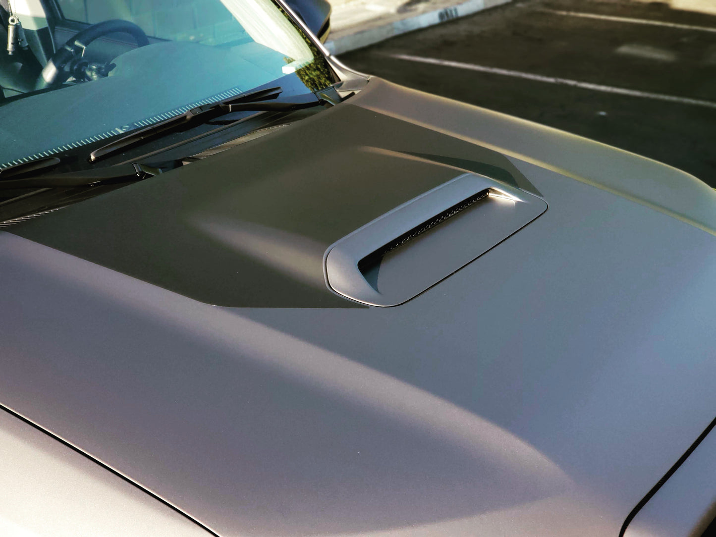 Matte black hood wrap. Made from vinyl sticker. 4Runner hood stamp.