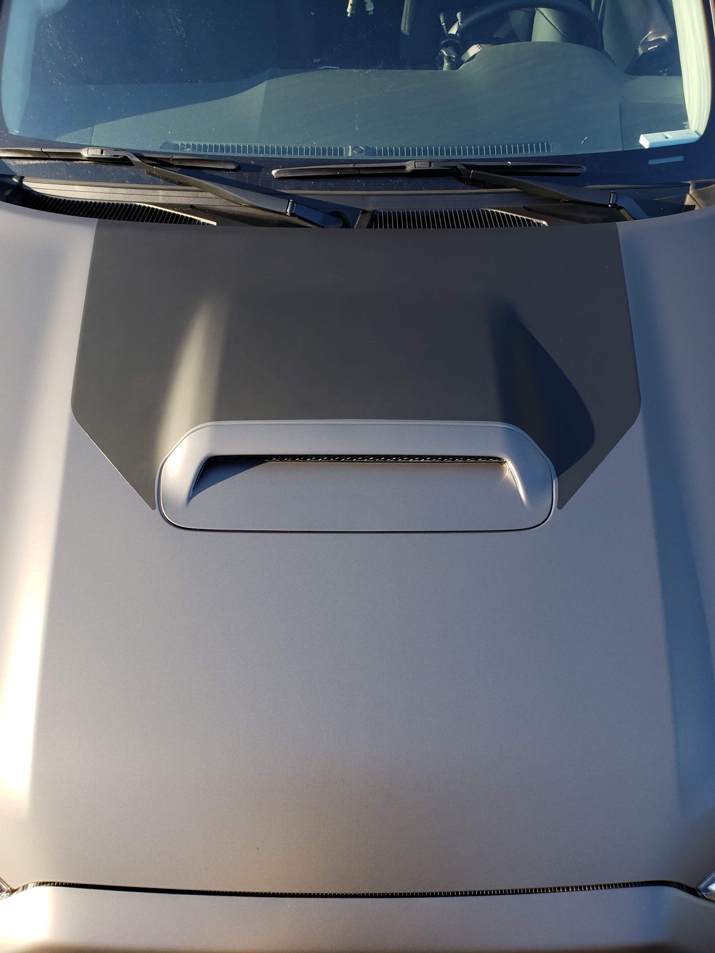 Aerial shot of Matte black hood wrap. Made from vinyl sticker. 4Runner hood stamp.